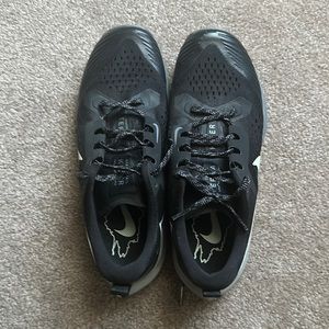 Black Nike trail running shoes